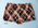 Nylon trunks hipster style in white orange and black geometric design zippered coin pocket RHS with triangle and chain SXL or 42