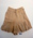 Silk shorts pleated with waistband, fastened by two buttons and two hooks and eye each side, machine sewn