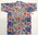 Sanforised cotton with Hawaiian design in red white blue green and black two chest pockets blue buttoned front short sleeves buttoned collar S16