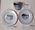 Bread and butter plate china white gold rim centre picture titled 'Surf boats at Manly, NSW, inscribed in black across bottom of picture square shape curved detail on corners